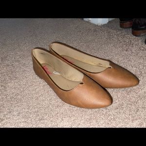 Brown leather flats